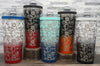 Ice Shaker Flex Bottle laser engraved with hibiscus flower pattern displayed as a group in all of the two-tone finishes: red/white, red/black, navy/mint, orange/black, and black/white.