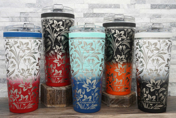 https://laseretchworks.com/cdn/shop/files/Group-of-Ice-Shaker-Flex-Bottles-Engraved-with-Lily-Flower-Wrap-Around-Design_600x.jpg?v=1695249030