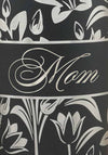 Zoom-in detail for laser engraved lily flower pattern with "Mom" added.