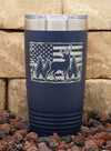 Laser engraved deer among trees with distressed American flag on a 20oz navy blue Polar Camel tumbler