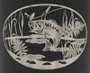 Zoom-in detail showing laser engraved bass fishing scene.